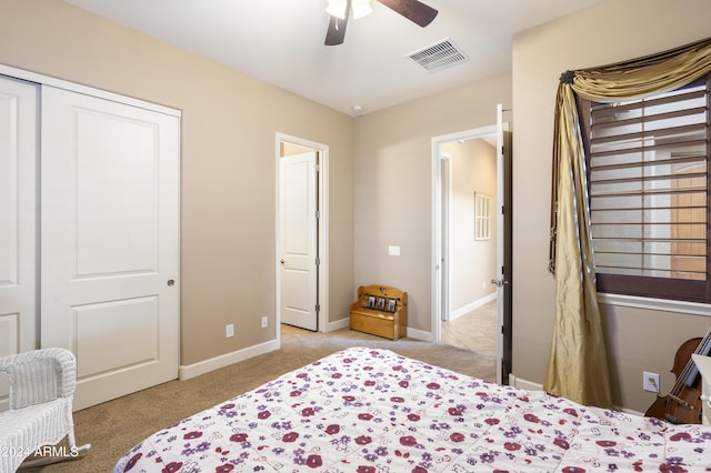 2378 N 158th Dr, Goodyear, AZ 85395 - bedroom with light carpet, a closet, a ceiling fan, and baseboards