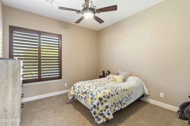 2378 N 158th Dr, Goodyear, AZ 85395 - carpeted bedroom with baseboards and ceiling fan