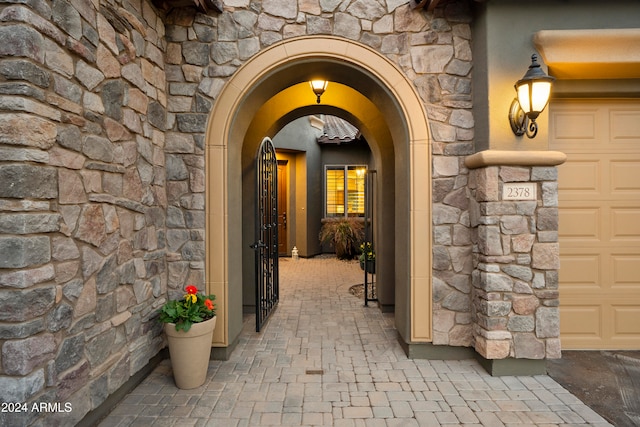 entrance to property featuring a garage