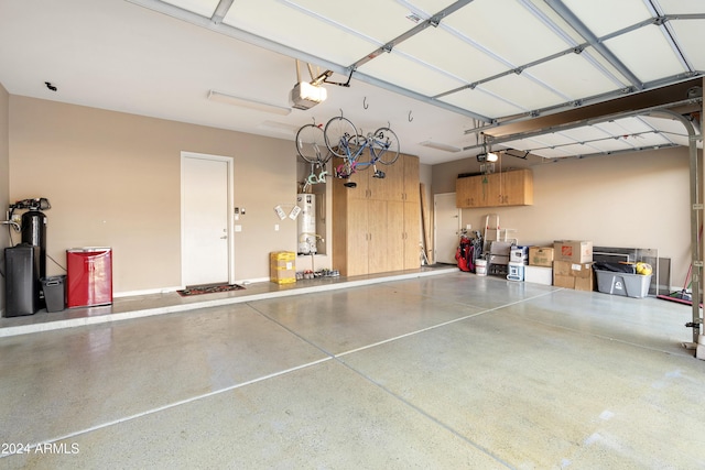 2378 N 158th Dr, Goodyear, AZ 85395 - garage featuring a garage door opener and gas water heater