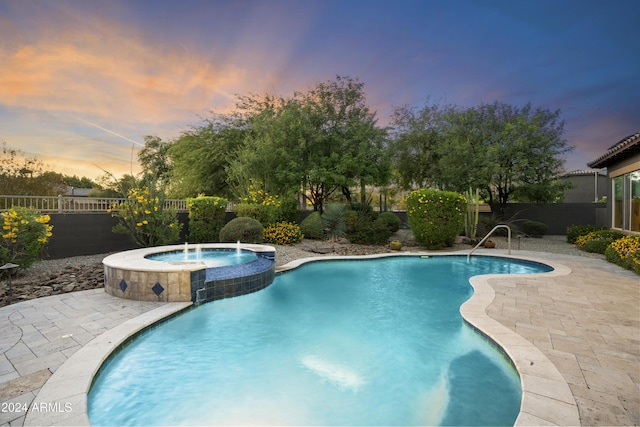 2378 N 158th Dr, Goodyear, AZ 85395 - view of pool featuring a pool with connected hot tub, a fenced backyard, and a patio area