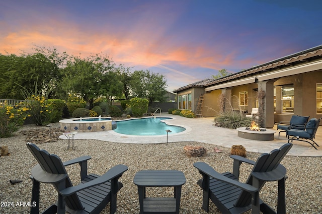 2378 N 158th Dr, Goodyear, AZ 85395 - view of pool featuring an outdoor fire pit, a patio, and a pool with connected hot tub