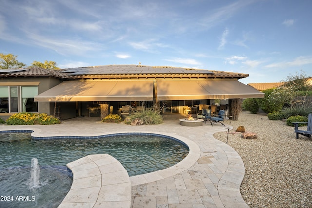 2378 N 158th Dr, Goodyear, AZ 85395 - swimming pool featuring a patio and a fire pit