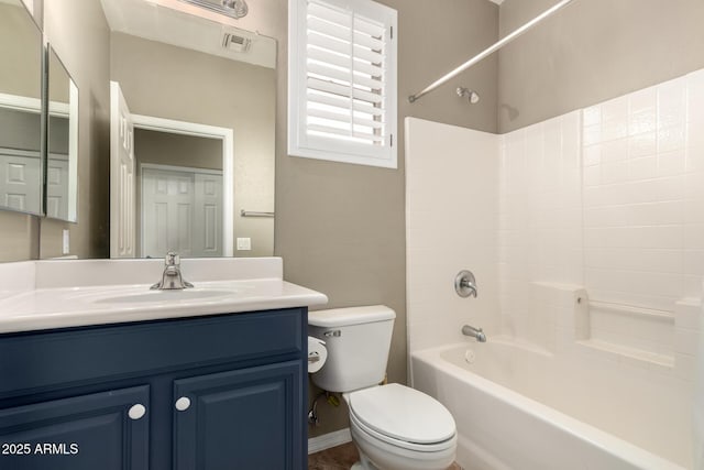 full bath with visible vents, vanity, toilet, and shower / bath combination