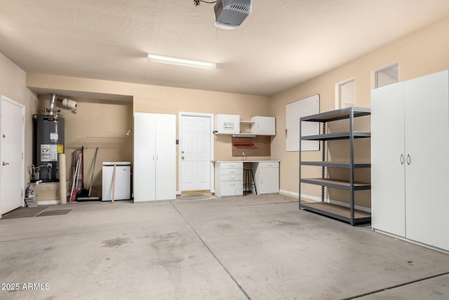 garage with a garage door opener and water heater