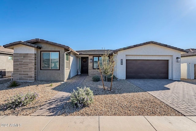 ranch-style house with a garage