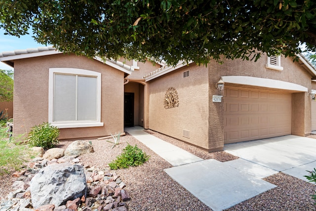 view of front of house with a garage