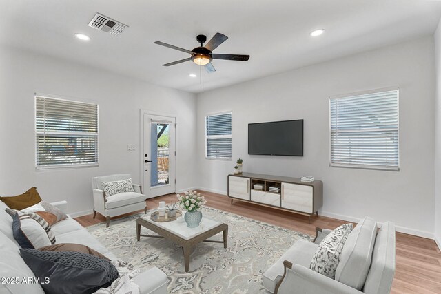 1306 E Fillmore St, Phoenix, AZ 85006 - living area featuring ceiling fan, wood finished floors, baseboards, and recessed lighting