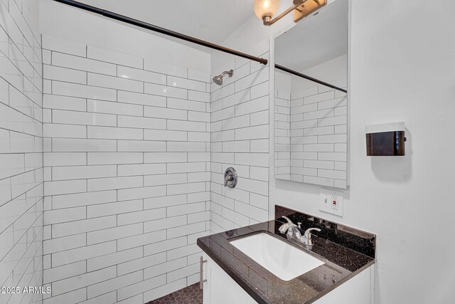 1306 E Fillmore St, Phoenix, AZ 85006 - bathroom featuring vanity and tiled shower