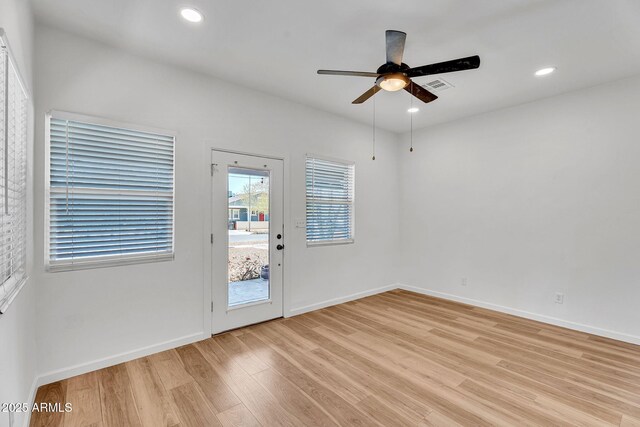 1306 E Fillmore St, Phoenix, AZ 85006 - empty room featuring light wood-style flooring, ceiling fan, baseboards, and recessed lighting