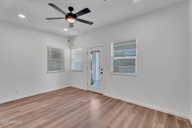 1306 E Fillmore St, Phoenix, AZ 85006 - empty room with wood finished floors, a ceiling fan, recessed lighting, and baseboards
