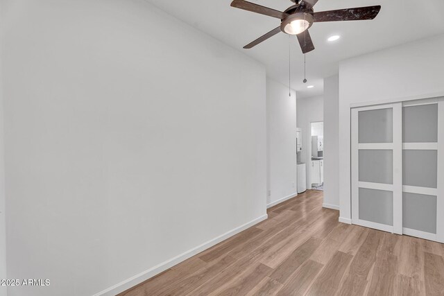 1306 E Fillmore St, Phoenix, AZ 85006 - unfurnished room featuring light wood-type flooring, ceiling fan, recessed lighting, and baseboards