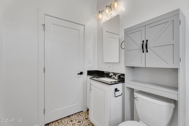1306 E Fillmore St, Phoenix, AZ 85006 - half bathroom with vanity and toilet