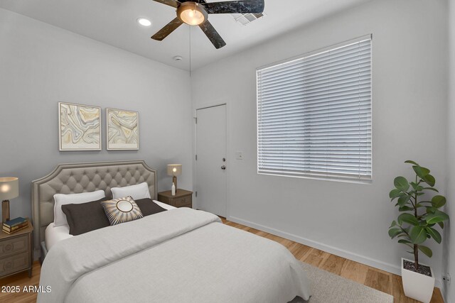 1306 E Fillmore St, Phoenix, AZ 85006 - bedroom featuring wood finished floors, baseboards, and a ceiling fan