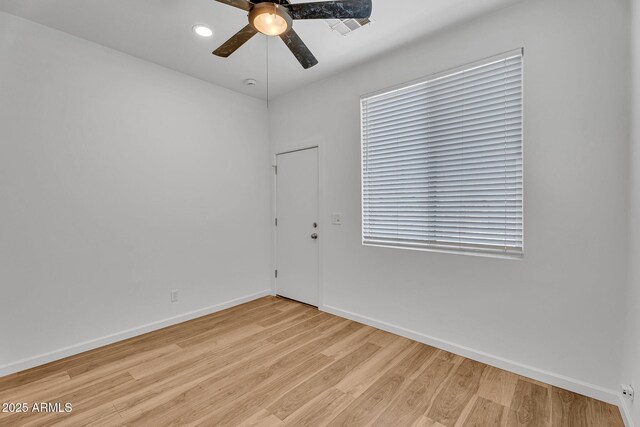 1306 E Fillmore St, Phoenix, AZ 85006 - spare room with ceiling fan, wood finished floors, baseboards, and recessed lighting