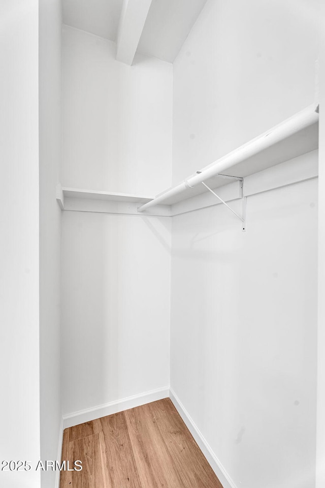 1306 E Fillmore St, Phoenix, AZ 85006 - walk in closet with wood finished floors