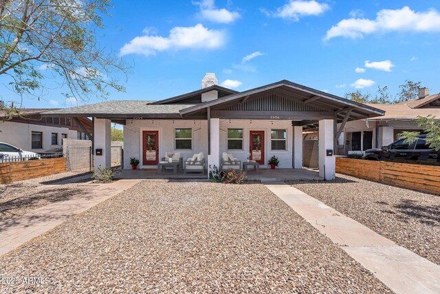 1306 E Fillmore St, Phoenix, AZ 85006 - view of front of home featuring covered porch, a chimney, and stucco siding
