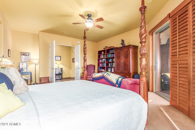 bedroom featuring visible vents, access to outside, a ceiling fan, and light colored carpet