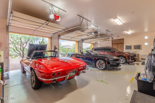 garage featuring a garage door opener