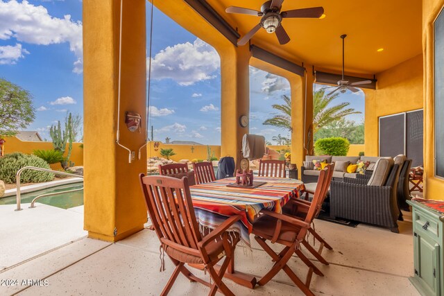 view of patio / terrace featuring a fenced in pool, outdoor lounge area, a ceiling fan, and outdoor dining space