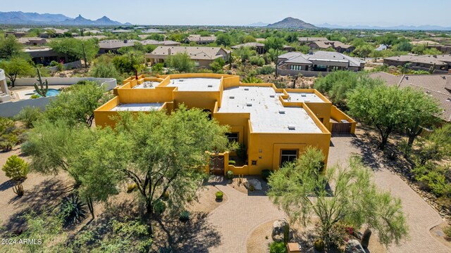 aerial view featuring a residential view and a mountain view