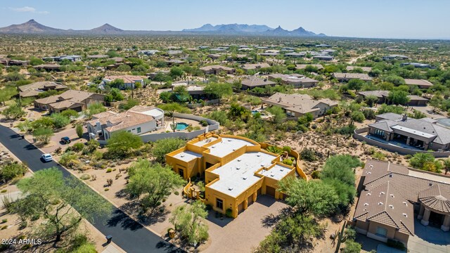 birds eye view of property featuring a residential view and a mountain view