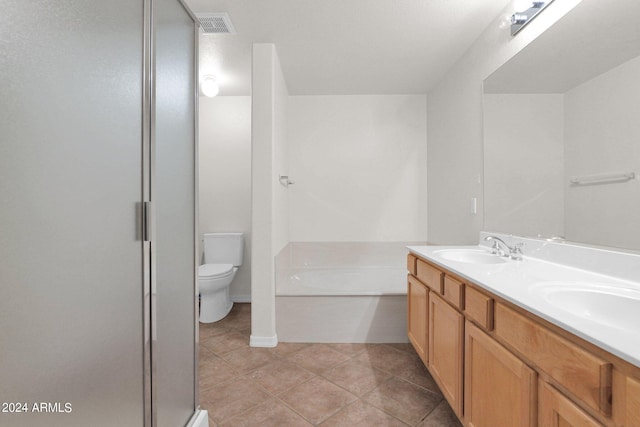 full bathroom featuring tile patterned flooring, separate shower and tub, vanity, and toilet