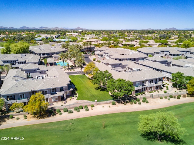 birds eye view of property featuring a mountain view