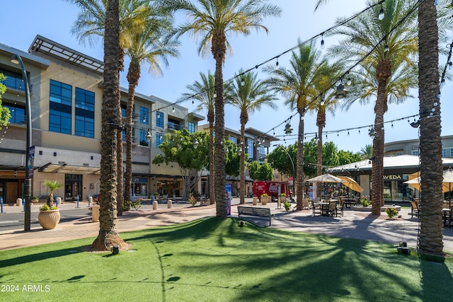 view of community featuring a yard