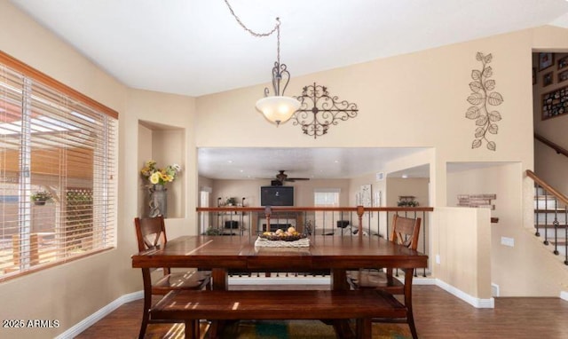 dining space featuring a healthy amount of sunlight and hardwood / wood-style flooring