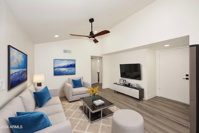 living room with high vaulted ceiling, a ceiling fan, light wood-type flooring, visible vents, and recessed lighting