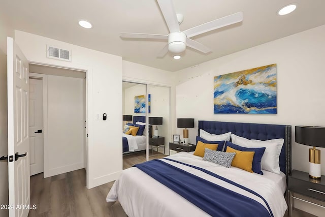 bedroom featuring a closet, wood finished floors, visible vents, ceiling fan, and recessed lighting