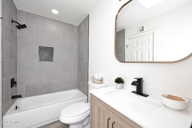 full bath featuring vanity, recessed lighting, toilet, visible vents, and washtub / shower combination