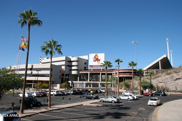 view of property with uncovered parking