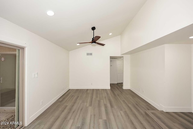 interior space with high vaulted ceiling, ceiling fan, and wood-type flooring