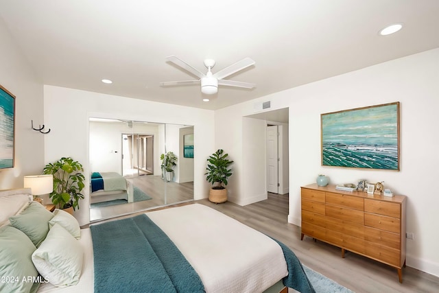 bedroom featuring visible vents, recessed lighting, and light wood-type flooring