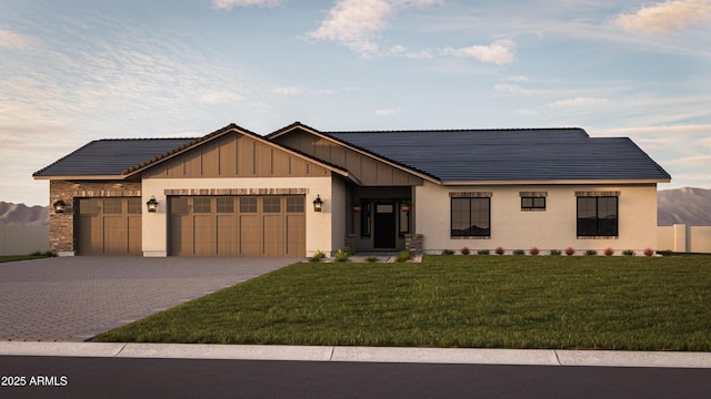 11263 E Crescent Ave, Mesa, AZ 85208 - view of front of property featuring an attached garage, decorative driveway, a front yard, board and batten siding, and stucco siding