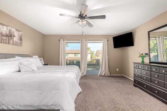 carpeted bedroom featuring ceiling fan and access to exterior