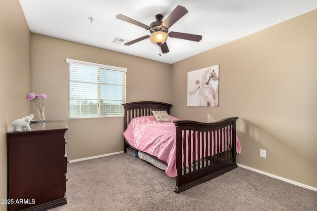 bedroom with ceiling fan and carpet flooring