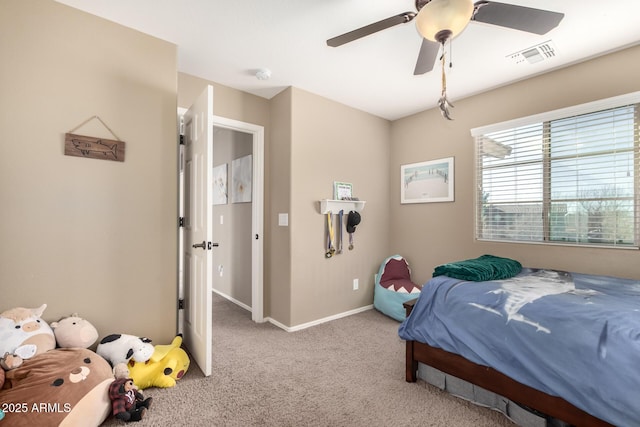 carpeted bedroom featuring ceiling fan