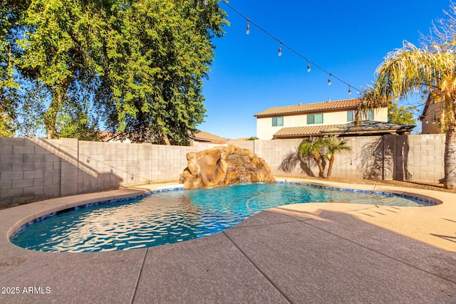 view of pool featuring pool water feature