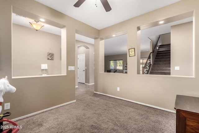 hallway featuring carpet