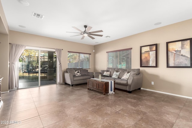 living room featuring ceiling fan