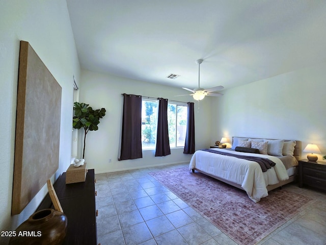 bedroom with tile patterned floors, baseboards, visible vents, and ceiling fan