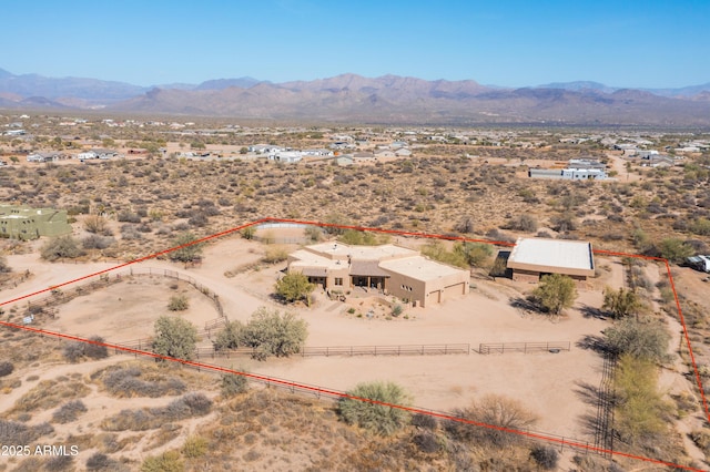 bird's eye view featuring a mountain view, a desert view, and a rural view