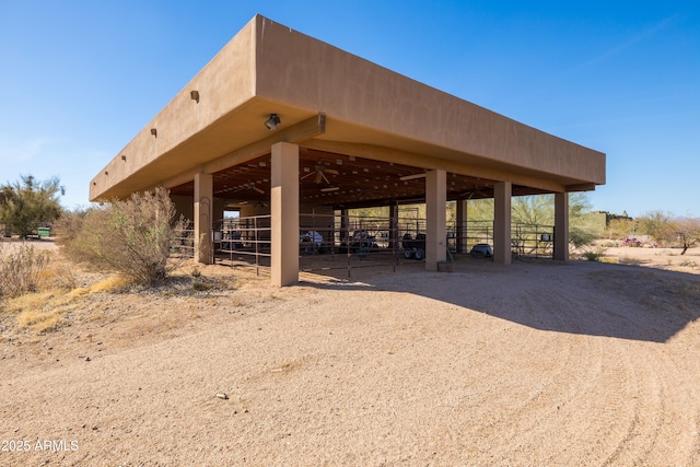 view of property's community featuring an outbuilding and an exterior structure