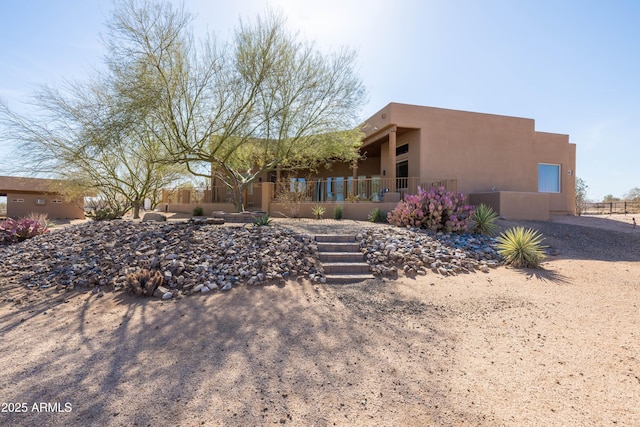 exterior space featuring stucco siding