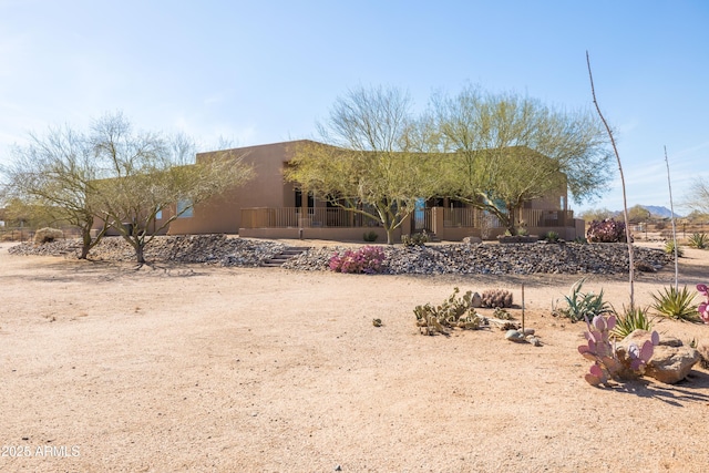 view of front of home featuring stucco siding