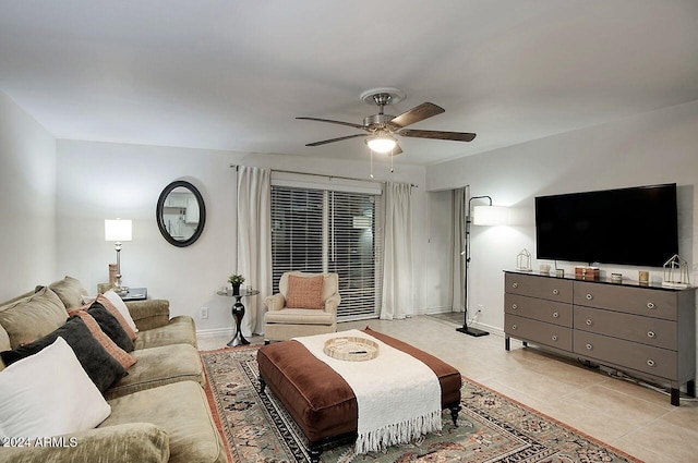 tiled living room featuring ceiling fan