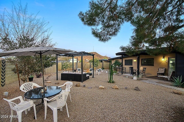 view of yard featuring outdoor lounge area, a patio area, and a pergola